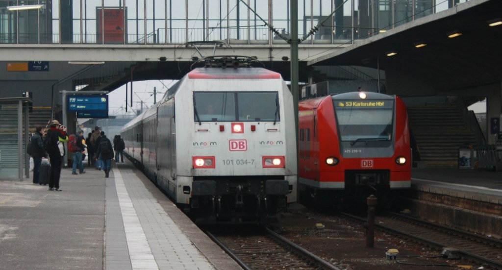 101 034-7 neben einem ET425 der S-Bahn Rhein-Necker in Heidelberg Hbf.

