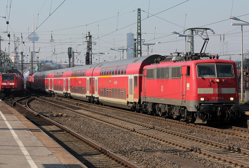 111 077-9 am RE 9 nach Siegen am 04.03.2011 in K�ln Messe/Deutz 