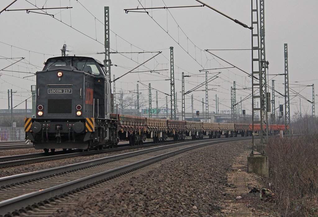 LOCON 217 mit Leerzug hinter Porz Wahn am 25.02.2011