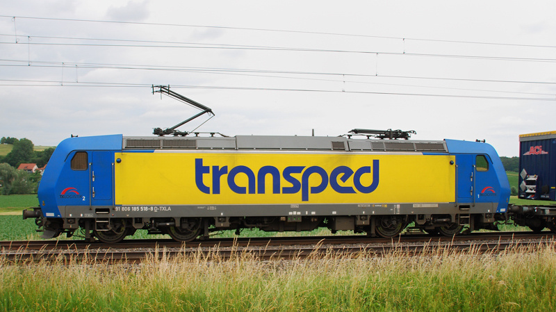 Portrait 185 518-8, TX, Transped, aufgenommen am 20.06.12, bei Treuchtlingen.