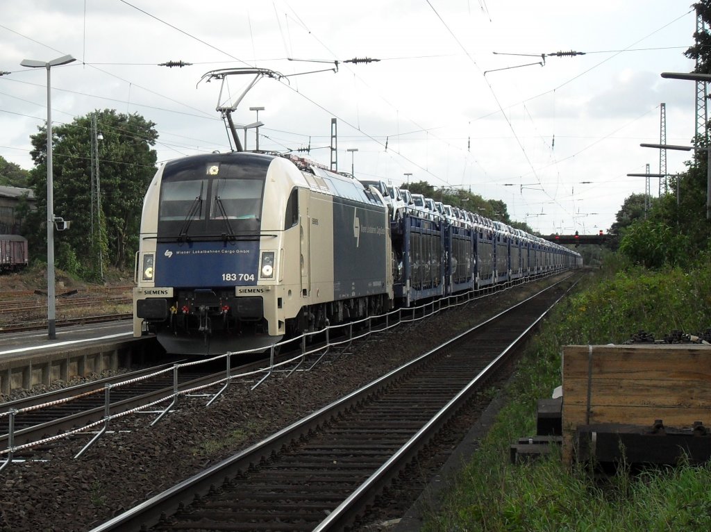WLBC 183 704 mit dem Dacia Zug in Beuel