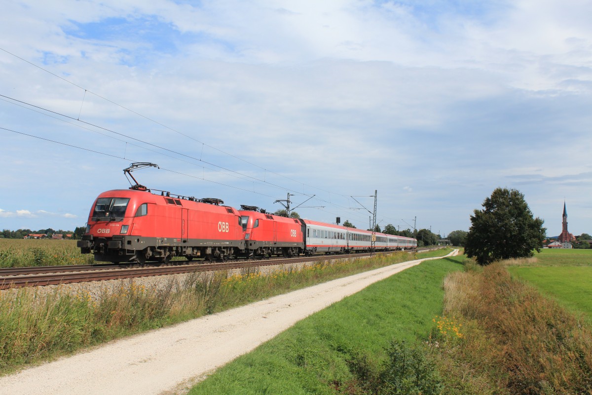 1116 159-5 und 1116 xxx am 8. September 2013 aus Salzburg kommend bei �bersee am Chiemsee.