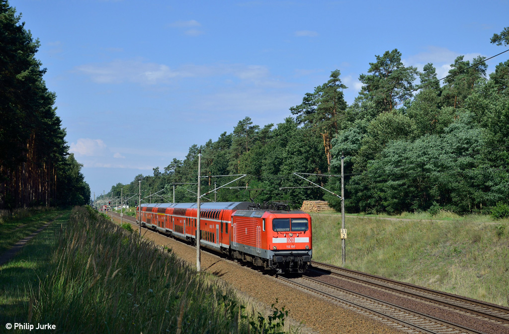 112 105-2 mit dem RE 18175 (Brandenburg Hbf - Frankfurt(Oder)) am 09.08.2014 bei Fangschleuse. 
