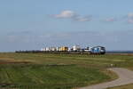 247 908  Debbie  war mit einem Autozug aus Sylt kommend am 15. September 2023 in Richtung Klanxb�ll unterwegs.