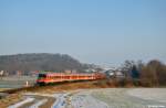 Die schiebende 218 387-9 mit dem RE 23039 (Kassel Hbf - Brilon Stadt) am 10.02.2013 bei K�lte-Wetterburg.