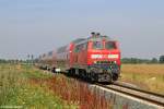Die 218 339-0 mit dem RE von Puttgarden nach Hamburg bei Burg auf Fehmarn am 28.07.2013