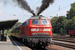 Die 218 217-8 als RE12 Richtung K�ln Deutz bei der Abfahrt in K�ln West am  04,08,09