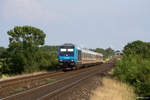 245 210-0 mit dem RE 11022 (Hamburg-Altona - Westerland(Sylt)) am 07.07.2017 in Klanxbüll am ehemaligen BÜ Dreieckskoog.
