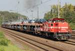 DE83 der HGK mit Ford Autozug in K�ln West am 01.09.2011