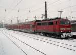 111 093-1 mit dem RE9 nach Giessen im winterlichen K�ln Messe/Deutz am 24.12.2010