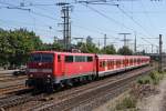Die 111 213-5 mit einer S-Bahn bei der Einfahrt in den N�rnberger Hbf am 25,05,11