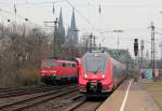 111 114 am RE7 und 442 259 als RE9 in K�ln Messe/Deutz am 03.04.2013