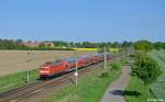 112 107-8 mit dem RE 4336 (Schwerin Hbf - Hamburg Hbf) am 15.05.2015 bei Brahlstorf.

