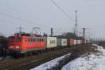 140 716 mit einem Containerzug in Ahlten am 04.01.2011