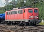 140 808-7 mit drei ihrer Schwestern im Zug, die wohl zur Verschrottung �berf�hrt wurden, aufgenommen in Gremberg am 28.07.2010