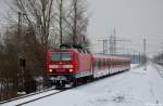 143 601-3 mit der S6 (Essen Hbf - K�ln-Nippes) am 20.01.2013 in Langenfeld-Berghausen.