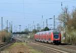 146 023-7 schiebt den RE 10130 von Dortmund nach Aachen am 14.04.2013 in Angermund.