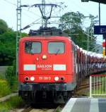 151 138-5 mit mit einem Ganzzug voller Audi&acute;s durchf�hrt am 31.07.2009 den Bahnhof Troisdorf.