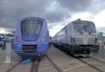 610 047-3 (Alstom Transport SA)  Triebzug Coradia Nordic  und 192 961-1 (Siemens AG)  Lokomotive Vectron AC  auf der Innotrans 2012 in Berlin-Messe/S�d am 22.9.2012.