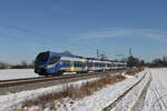 ET 318 auf dem Weg nach M�nchen am 24. Januar 2022 bei �bersee am Chiemsee.