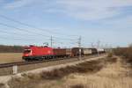 1116 122-3 mit einem gemischten G�terzug am 20.